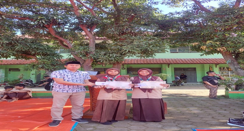 Nur Fathiyyah dan Syifa Nur Aqila, Peraih Medali Perunggu dalam Penulisan Cerpen dan Puisi dalam Olimpiade Update Festival IX Tahun 2024